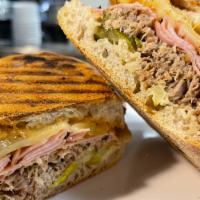 Spicy Cuban · Smoked ham, pulled pork, Swiss cheese, pickles, chipotle mayo, mustard, ciabatta bread.