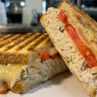 Tuna Melt · Tuna salad, American or provolone cheese, tomatoes, sourdough bread.