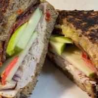 The Vermonter · Roasted turkey, bacon, maple smoked Cheddar cheese, red onion, tomato, green apple, garlic s...
