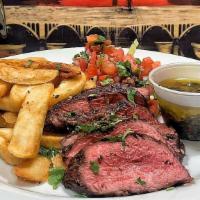 Steak Chimichurri  (Available Everyday!) · Char grilled steak, sliced and served with steak fries, salad & the classic,
Brazilian garli...