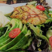 Baja Chicken Salad (Monday Only!) · Grilled Chicken Over Greens with
Blended Cheese, Cherry Tomatoes,
Roasted Corn & Avocado, Ja...