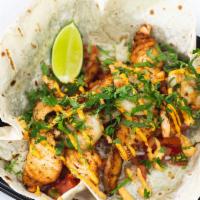 Open-Face Burrito Shrimp & Salmon  · Marinated Shrimp & Salmon, Rice,
Lettuce, Pico De Gallo on a grilled Flour. Tortilla with Ho...