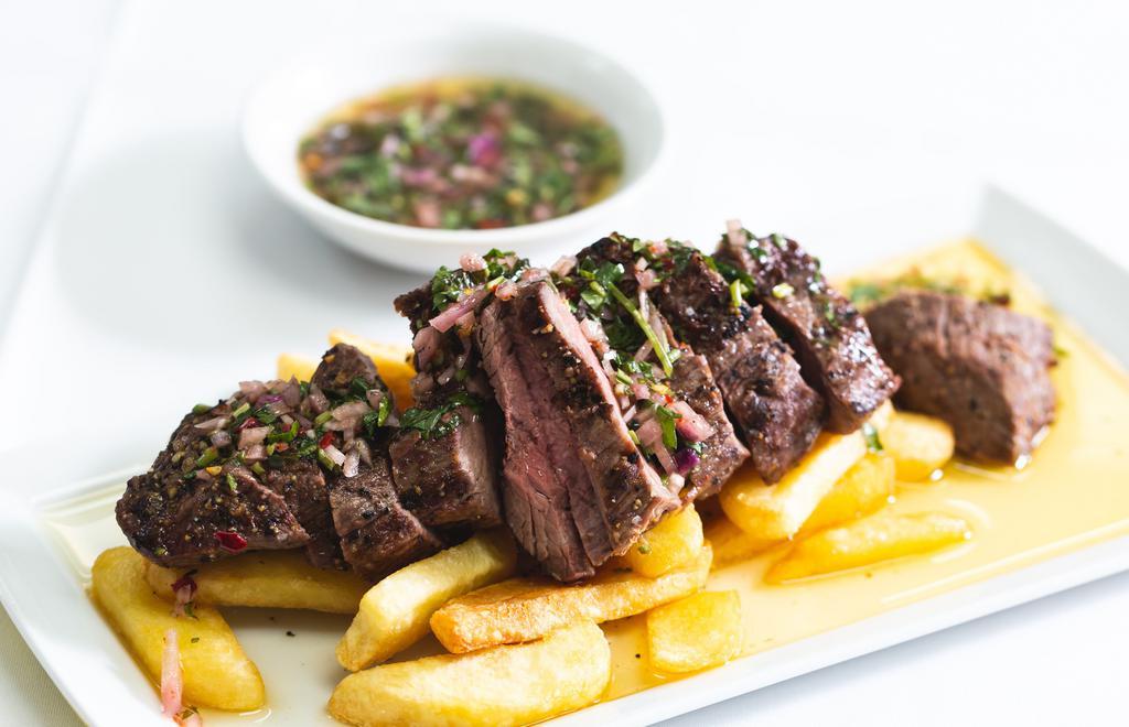 Steak Chimichurri  · Char grilled steak, sliced and served with steak fries, salad & the classic, Brazilian garlic-herb sauce.