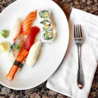 Sushi Lunch · Served with rice and miso soup. Chef's choice of 6 pieces sushi & 3 pieces California roll.