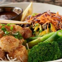 Pan Seared Sea Scallop · With vegetable in soy bean sauce, served on a bed of crunch noodles.