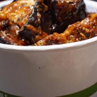 Just Eggplant · Roasted tomato garlic eggplant topped with choice of savory sauce. <br />12 oz bowl. Gluten-...