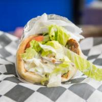 Ny Style Chicken Gyro · chicken Gyro meat in pita bread with lettuce tomato onion and white sauce