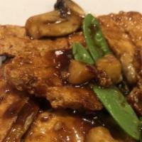Sautéed Pork With Tofu · Shredded pork, firm tofu, black mushroom and bamboo shoots in chef's special sauce.