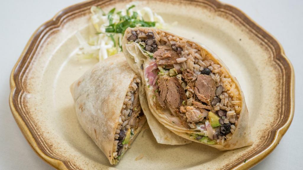 Burrito · Your choice of meat, black or refried beans, rice, lettuce, mixed or oaxaca cheese, green salsa & sour cream.