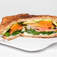 Sweet Potatoes · Sweet potatoes, avocado, tomatoes, spinach, green peppers, goat cheese, and honey.