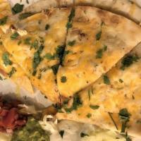 Chicken Quesadilla · Shredded chicken breast grilled peppers and onions cheddar jack cheese, served with salsa, g...