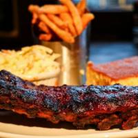Baby Back Ribs · Slow cooked and smothered with drake's bbq sauce, served with French fries, Corn on the Cob ...