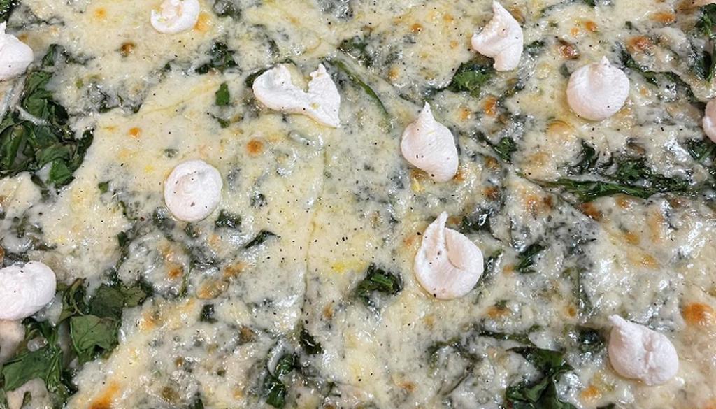 Personal Florentine · Roasted garlic spread, spinach, farmers cheese, fontina, ricotta with sea salt, black pepper, & lemon zest