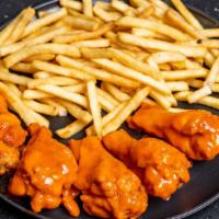 Wings · Seasoned wings served with your choice of shoelaced fries or onion rings.