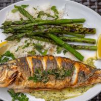 Roasted Whole Bronzino · Basmati rice and asparagus. Make it stuffed with crab meat for an additional charge. Crab me...
