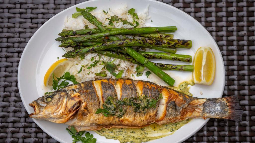 Roasted Whole Bronzino · Basmati rice and asparagus. Make it stuffed with crab meat for an additional charge. Crab meat will be served on the side to go orders.