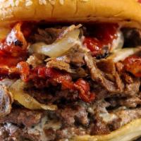 Philly Special Buddy · Buddy with bacon and American cheese topped with tender cut ribeye, fried onions, ketchup, a...