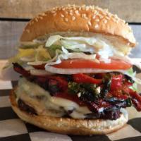 Soprano · Buddy with roasted peppers, Parmesan cheese, roasted garlic mayo, garlic spinach, lettuce, t...