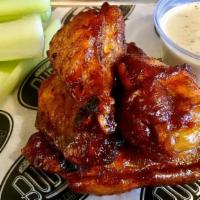 5 Smoked Wings  · Tossed in one of our sauces: voodoo, carolina BBQ, Texas BBQ, or buffalo. Side of blue chees...