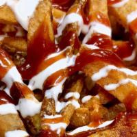 Bbq Ranch Fries · Fries topped with BBQ and ranch dressing.