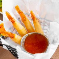 Shrimp Spring Rolls  · Served with a tangy sauce.(4 PCS)
