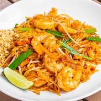 Pad Thai · Thin rice noodles stir-fried with egg, bean curd, scallion, bean sprouts and crushed peanuts.