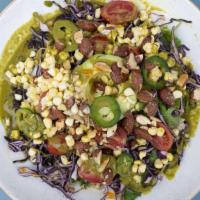 Avocado Sol · Rice & beans, raw corn & purple cabbage, jalapeño, tomato, avocado, almonds & cilantro lime...