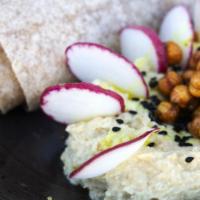Hummus Bowl · Cold-pressed olive oil, radish, crispy chickpeas & warm tortilla