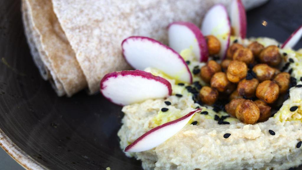 Hummus Bowl · Cold-pressed olive oil, radish, crispy chickpeas & warm tortilla