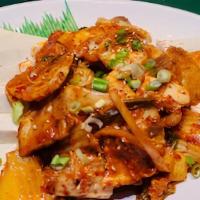 Kimchi Pork Stir-Fried · With tofu.