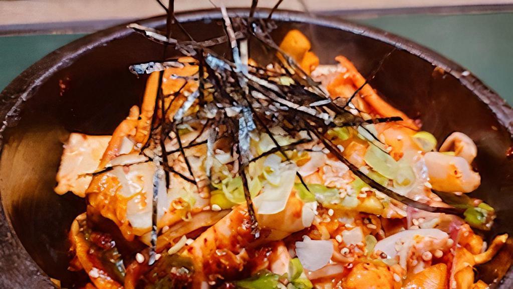 Seafood Bibimbop · With shrimp, squid and vegetables.