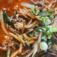 Spicy Beef Soup · With beef, soybean sprout, onion, green onion, egg and noodle.