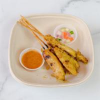 Chicken Satay · Skewered chicken tenders marinated in Thai blend of herbs and spices, slow-grilled and brush...