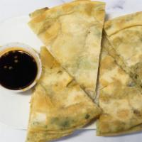 Scallion Pancake  · Deep-fried dough with minced scallions served with a light soy & ginger blended sauce.
