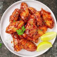 Smokin' Honey Bbq Wings · Fresh chicken wings breaded, fried until golden brown, and tossed in honey and barbecue sauc...