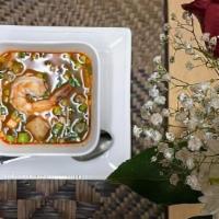 Tom Yum · Hot & Sour soup with lemongrass, galangal, mushroom, scallion and cilantro. Choose Chicken/V...