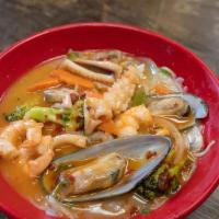 Hot & Spicy Seafood Ramen · Shrimp, squid, mussels, snow bean, mushroom, carrots, scallion.