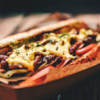 Bbq Cheesesteak · Thinly sliced and marinated beef with satisfying BBQ sauce. Served as a classic cheesesteak.