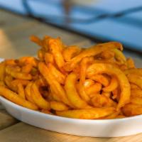 Cheesy Curly Fries · Delicious curly fries with delectable cheese.