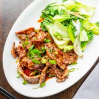 Korean Beef · Tender slices of our Korean style marinated beef served with wok-seared baby bok choy.