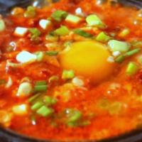 Korean Soft Tofu Soup · Traditionally served with tofu served piping hot with an egg. Comes with choice of protein.