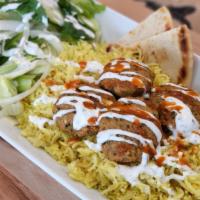 Falafel Over Rice W/ Salad · Falafel, grilled onion, and pepper served on Box'd basmati rice and house salad featuring 16...