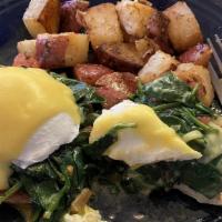 Florentine Benedict · 2 Poached eggs, sautéed spinach and tomatoes on grilled English muffin with hollandaise.