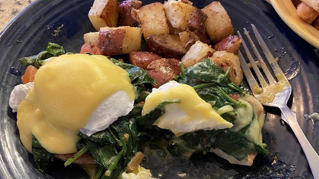 Florentine Benedict · 2 Poached eggs, sautéed spinach and tomatoes on grilled English muffin with hollandaise.
