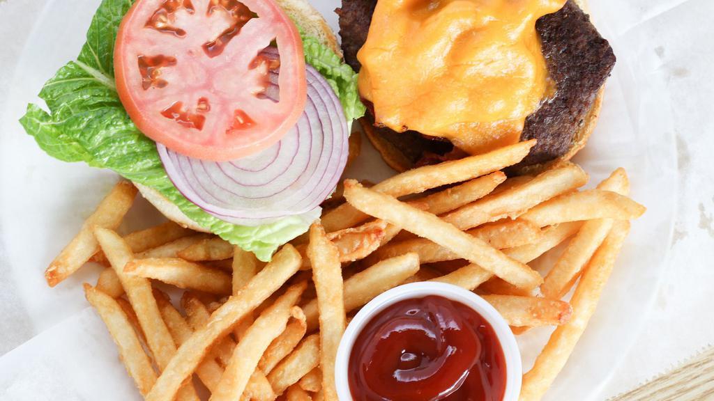 Bacon Cheddar Burger · 1/2 lb of 100% angus beef served on an onion roll or sesame bun with lettuce tomato onion and fries.