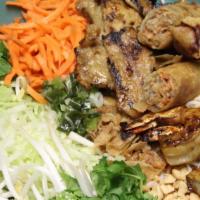 91 - Deluxe Vermicelli · Comes with shrimp, spring roll and grilled pork. Rice vermicelli, mixed greens, bean sprouts...