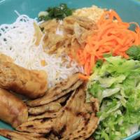 93 - Grilled Pork & Spring Roll Vermicelli · Grilled pork and one spring roll, rice vermicelli, mixed greens (bean sprouts, lettuce, mint...