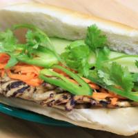 125 - Grilled Pork Hoagie · Toasted hoagie with grilled pork, butter, sautéed scallions, jalapeño peppers, cucumber, cil...