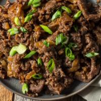 Szechuan Beef · Flank steak with Szechain chillis, cooked with soy sauce, and green onions served with white...