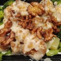 Shrimp With Walnut · Crispy jumbo shrimp in a super, exciting sweet, pungent original sauce, and topped with hone...